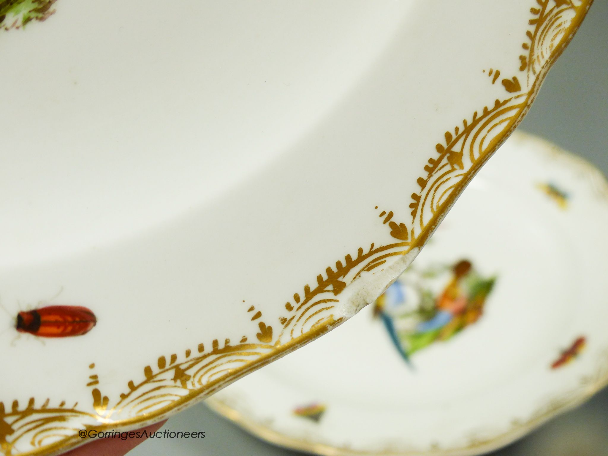 A set of six Meissen dessert dishes, painted with birds,factory seconds, 25.5cm diameter